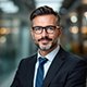 Happy Client Sharing Success Story with EuroLink Satisfied business owner discussing successful company setup in Dubai through EuroLink services.