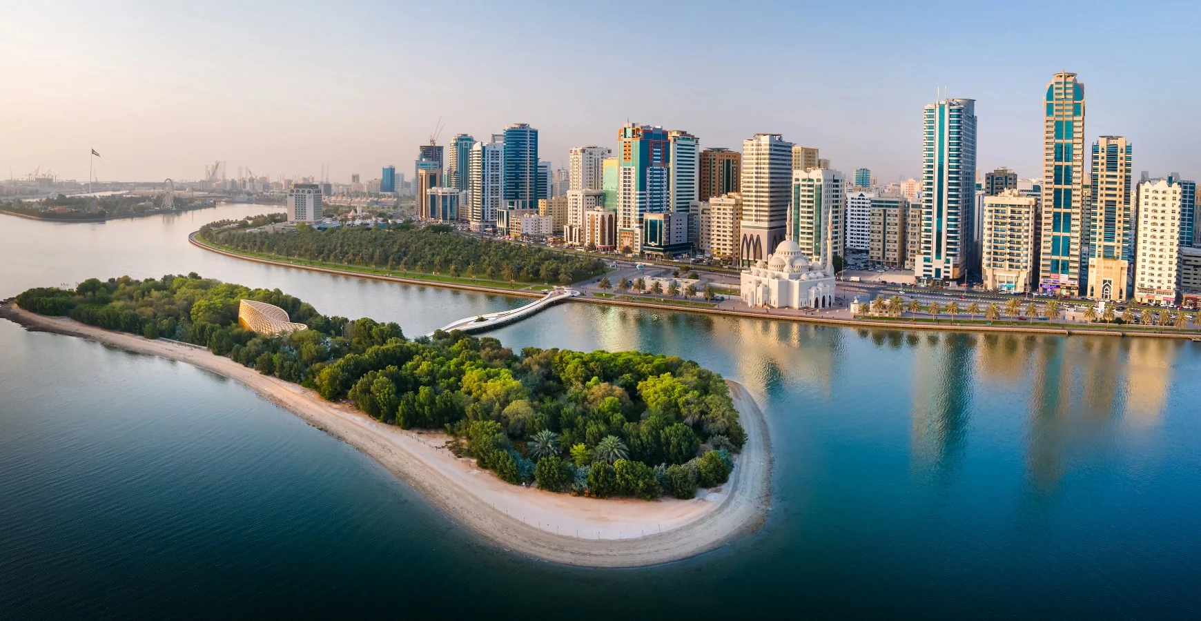 Aerial view of Sharjah skyline representing Sharjah Publishing City free zone business setup